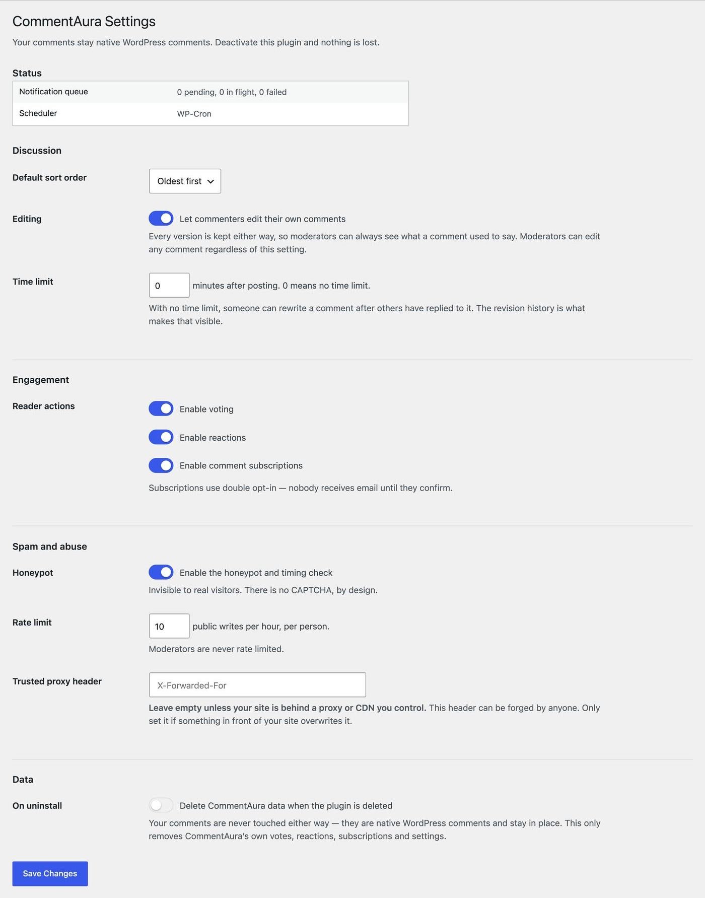 The CommentAura settings screen with toggle switches for editing, voting, reactions, subscriptions, honeypot and data removal, plus number fields for the edit time limit and rate limit.